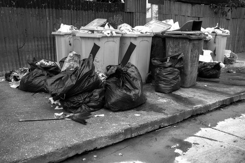 Construction site with waste removal trucks in Elephant and Castle